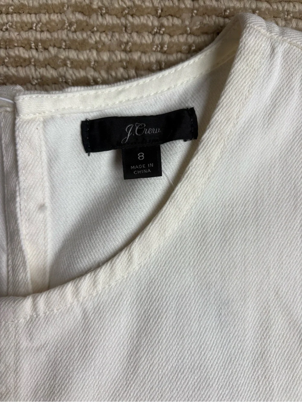 J Crew Denim dress with distressed hem with tags.